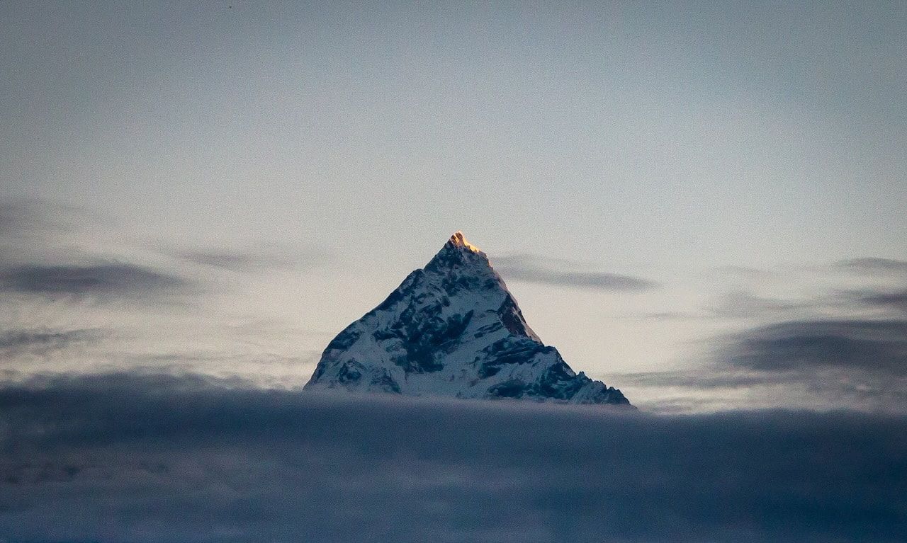 Machhapuchhare Nepal Himalaya Peak through the clouds - God Dieux Photography - 
